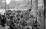 Krishna Seegopaul speaking, Counsellors Donald Witzel and Leonora Amstrong front row left, Rooplall Dudhnath on Leonora’s left, Bahá’í youth camp near Georgetown (12/75)