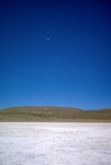 The moon over a dried lake near the village of Huarcu