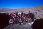 Bahá’ís gathered in the village of Huarcu, with our two guides kneeling on either side