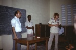 Counsellor Farzam Arbab, Georges Marcellus and Stuart North at a meeting at the Anís Zunúzí Bahá'í School (10/81)
