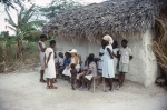 Carrie Smith-Dahl with villagers near Port-au-Prince (7/82)