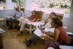 Hans Thimm, Glen Eyford, Counsellor Farzam Arbab, Auxiliary Board member Linda Gershuny, meeting of the Administrative Council of the Anís Zunúzí Bahá'í School (6/83)