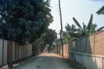 Vientiane, road in front of Bahá’í Center (fence left)