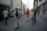 David Walker (blue jacket), Denny Allen far right, in front on conference venue, St. Louis (8/74)