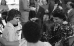 Carol Rutstein (left) and Mimi McClellan (right) talking with Dawn Smith, wedding of Dawn Smith and Greg Dahl, Amherst, Mass. (10/74)