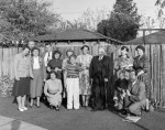 After the Feast of Ridván, at the Joyce & Arthur Dahl home in Palo Alto, California,  principal guests Emeric and Rosemary Sala. Emeric is kneeling right with Roger Dahl on his knee. Valerie Wilson center with striped dress.  4/21/1951