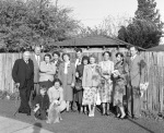 After the Feast of Ridván at the Joyce & Arthur Dahl home, Palo Alto, l-r standing: Mr. Pepplebaum, Tom Lisota, Barbara Ogden, Virginia Breaks, Vivian Lisota, Glenn & Lois Lissner, Doris Bosserman, Valerie Wilson, Rosemary & Emeric Sala; kneeling: Roger Dahl, Joyce Lyon Dahl, Fluffy (dog), 4/21/51