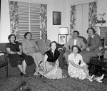 l-r sofa: Mrs. Banání, Octavia Jones, Músá Banání; right rear: Amin Banání, Barbara Ogden Morrow; seated on floor: Sheila Banání, Arthur and Joyce Dahl, at Mrs. Jones' for dinner 6/8/53