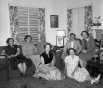 l-r sofa: Mrs. Banání, Octavia Jones, Músá Banání; right rear: Amin Banání, Barbara Ogden Morrow; seated on floor: Sheila Banání, Arthur and Joyce Dahl, at Mrs. Jones' for dinner, Palo Alto 6/8/53