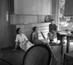 Nancy Phillips, Joyce and Arthur Lyon Dahl, Grove Becker background right at Bahá’í weekend, Pebble Beach, 6/16/56