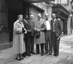 After the Guardian's funeral, l-r Charlotte Linfoot, Enoch Olinga, John Robarts, ?, ?, Aziz Yazdi, in front of Hotel Normandie, London 11/12/1957