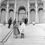 on steps: Nancy Phillips and Arthur Lyon Dahl, 1959?