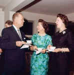 Charles Wolcott, Joyce Dahl and Velma Sherill at reception for Paul Haney, Wilmette, 4/61