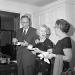 NSA reception for Paul Haney, l-r: Dave Ruhe, Harriett Wolcott and ?,  4/30/1961