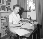 Nancy Phillips at desk 5/9/1961