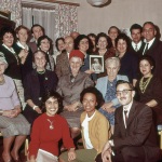 Luxembourg Bahá’ís, Honor Kempton (center, red hat), Joyce Dahl (behind photo of ‘Abdu’l-Bahá) 10/61 (from dupl.)