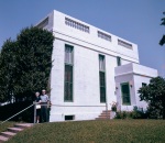Charles and Harriett Wolcott in front of Hazira, Wilmette, 8/1/60