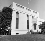 Charles and Harriett Wolcott in front of Hazira, Wilmette, 8/1/60