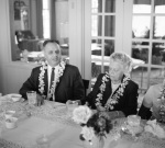 N.S.A. at dinner Sunday, wearing leis I brought from Hawaii; Mr. & Mrs. Khadem guests 10/14/1962