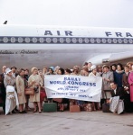 Passengers on charter flight, London, 4/63