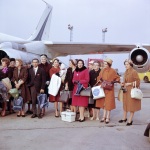 Passengers on charter flight, London, 4/63