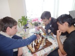 Playing chess with friends in our apartment, Sofia, December