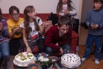 The twins celebrating their birthday with friends at home, early December