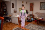 Mina leaving for her first day in first grade, in our living room, Blagoevgrad, September