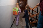 Mina leaving for her first day in first grade, in our apartment hallway, Blagoevgrad, September