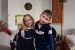 Joyce and Gregory leaving for their first day in second grade, in our living room, Blagoevgrad, September