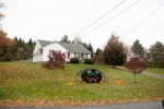 A front yard Holloween decoration made from a bale of hay, near Bard College, October
