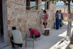 Workers working on our house in Krupnik, August
