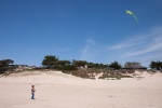 Flying kites on the Carmel River Beach in April