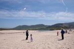 Flying kites on the Carmel Beach in April