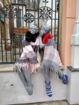Winter clothes on the statues in from of the municipal building, Hluboká, February
