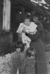 Joyce Lyon at 6 months with mommy & sisters