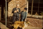 Arthur Sr. and Lenna Dahl in patio with collie, 12/26/1943