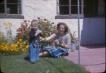 Joyce & Arthur Lyon on patio with Kit, 6/4/1944
