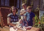 Joyce, Keith, Arthur and Roger in garden, 9/46