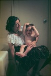 Joyce and Roger in bathroom, 8/17/1947