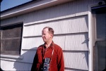 Palo Alto: back yard, Dad with camera, 3/3/1955