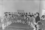Emi with kindergarten classmates, performance, c. 1967